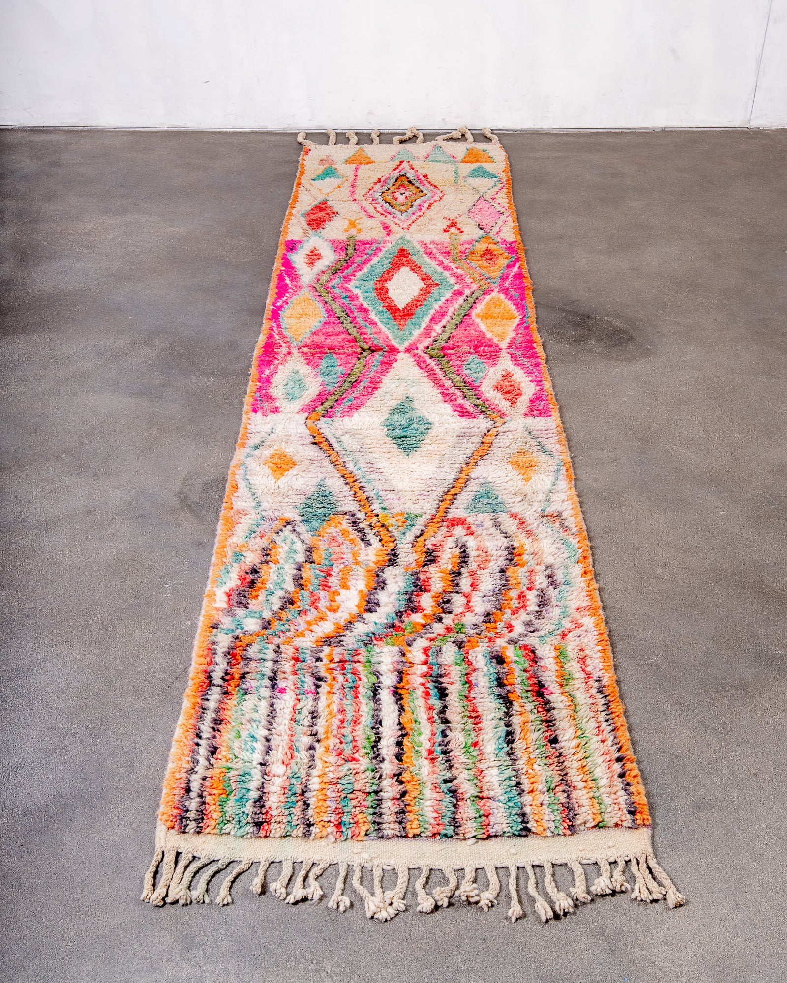 Modern designer handcrafted Berber rug from Morocco. Boujed with beautiful colors and patterns